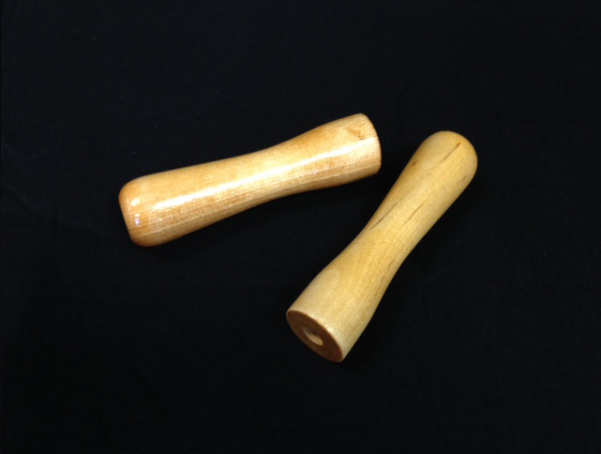 Two small custom wooden handles with one hole on one end